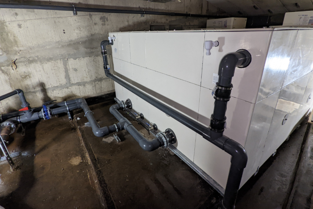Cold water storage tank replacement at Derngate Theatre with tight access installation